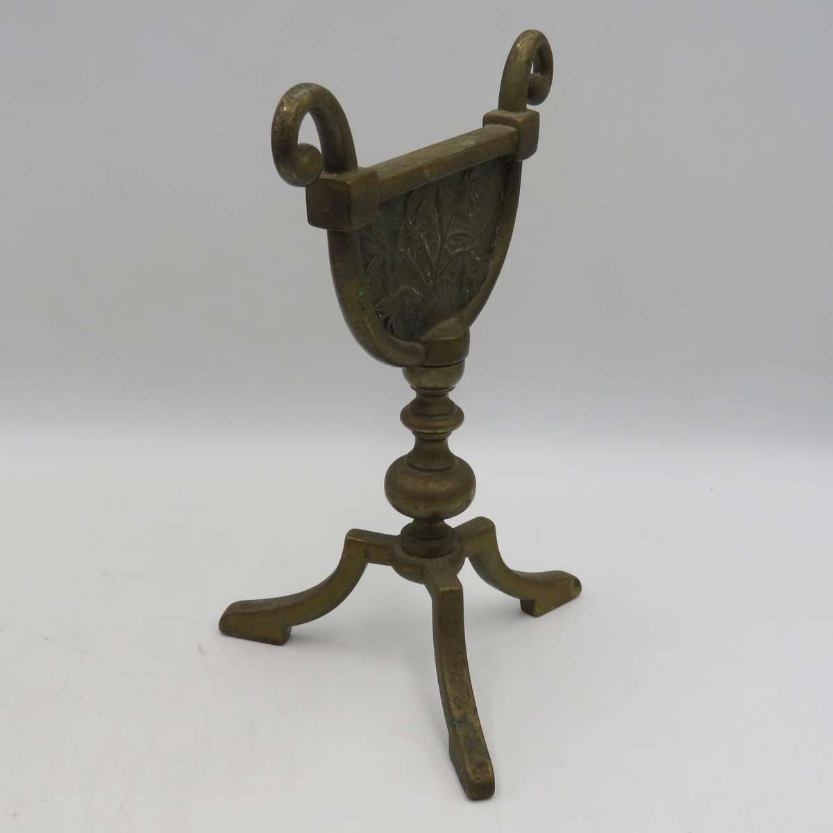Antique brass stand for fire tools