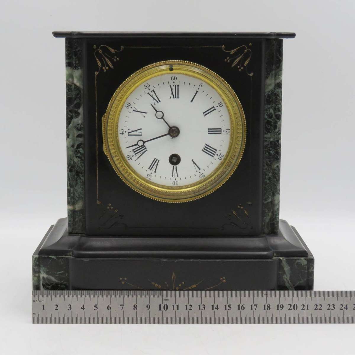 Antique Mechanical mantel clock with marble case - runs and stops