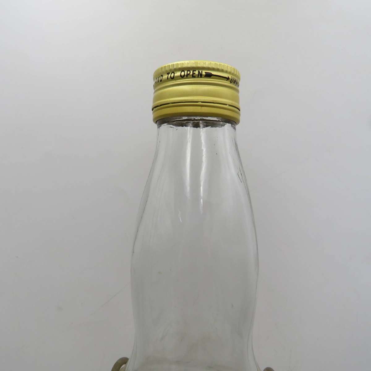 Bell's Scotch Whisky 4.5lt glass bottle on tipping stand - Empty