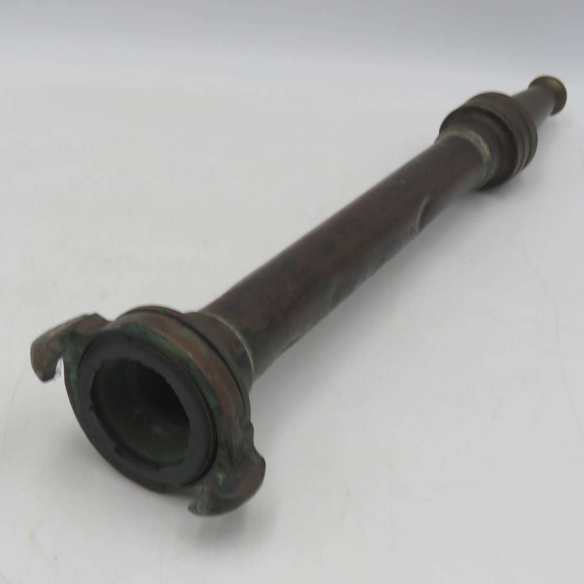 Antique brass fire hose nozzle