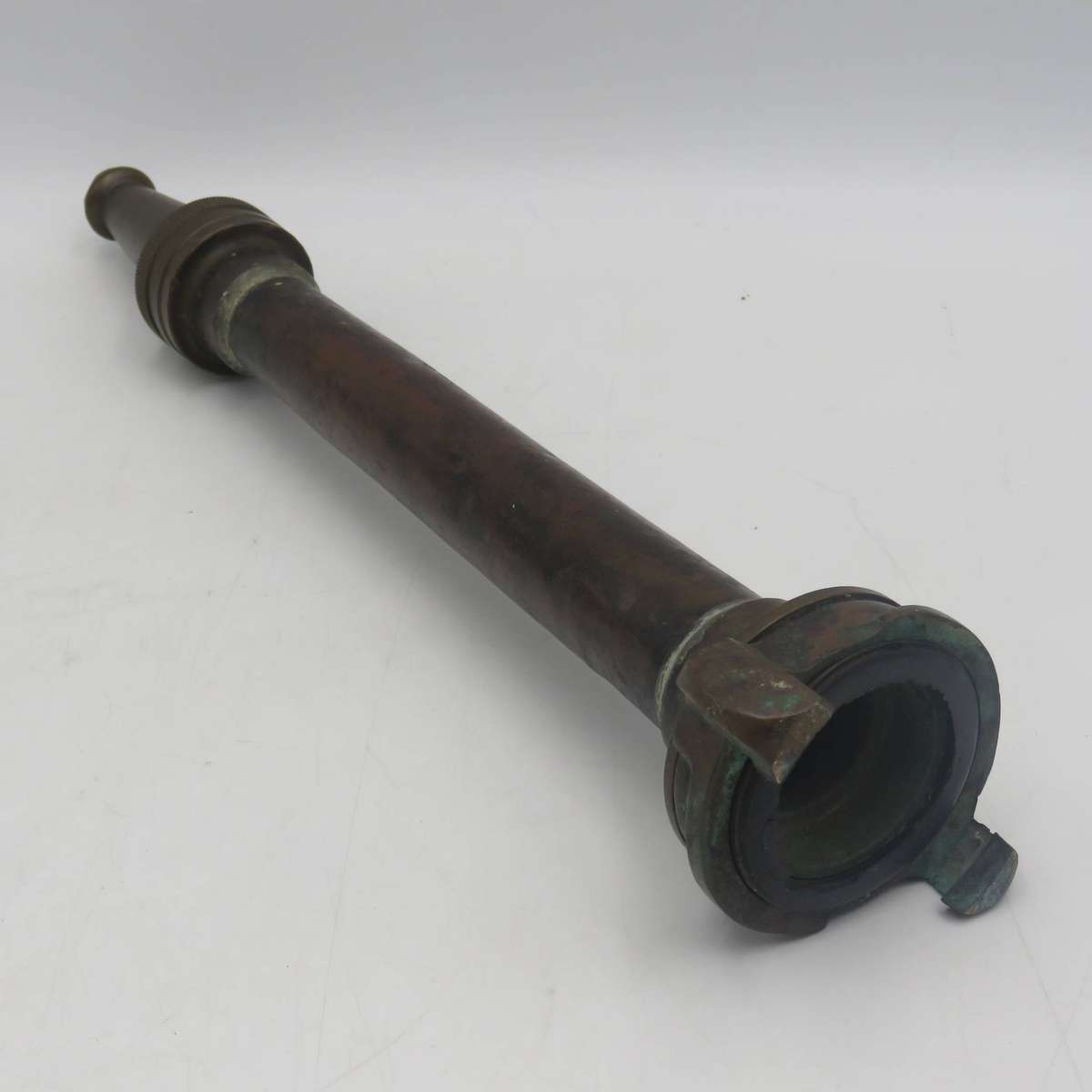 Antique brass fire hose nozzle