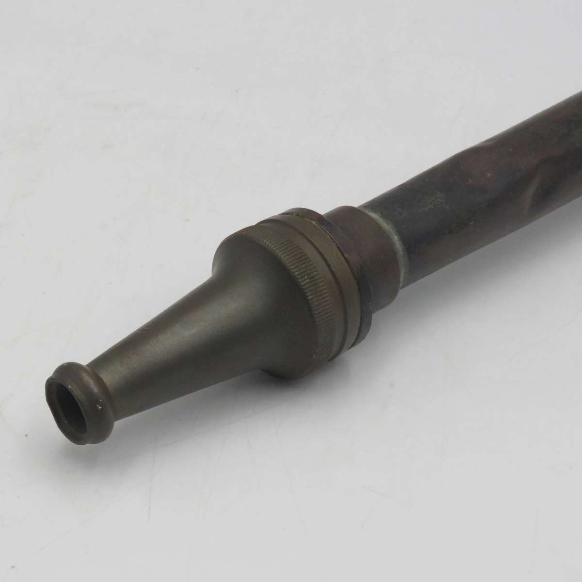 Antique brass fire hose nozzle