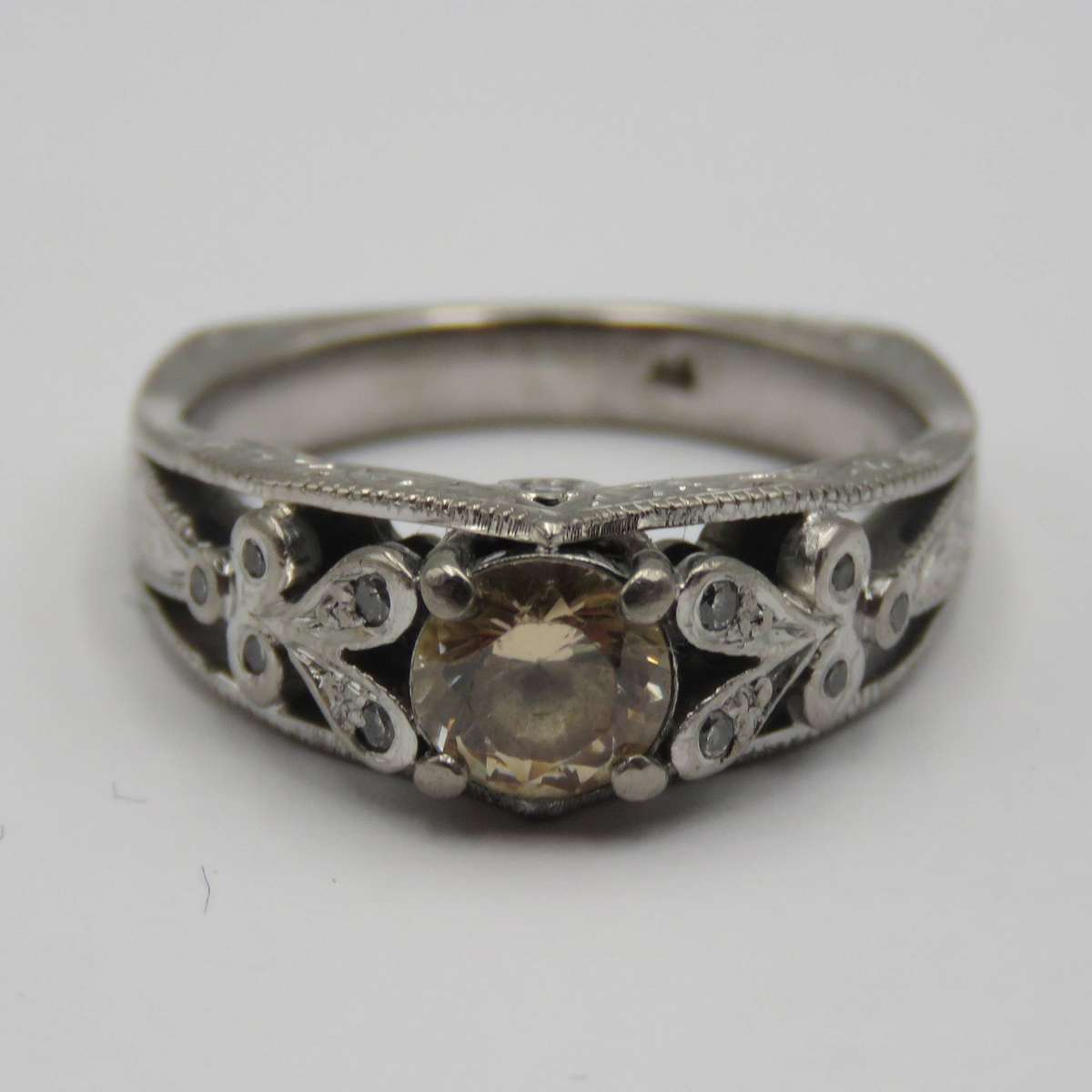 Bespoke 9kt White gold ring with Champagne citrine with 12 small diamonds in design - weighs 5,4g