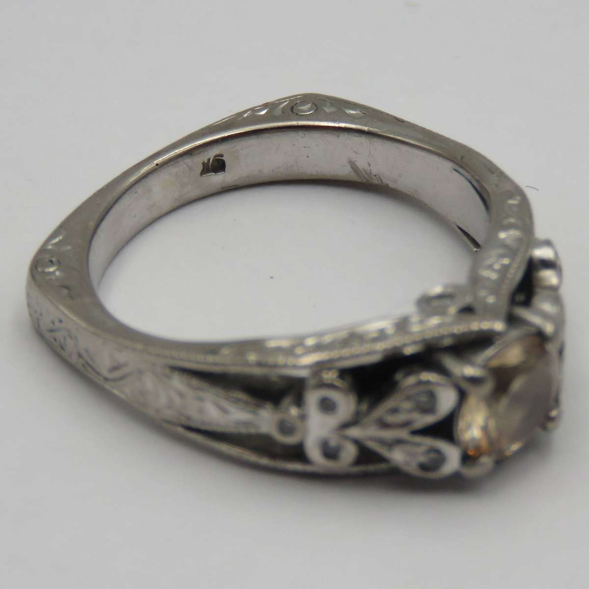 Bespoke 9kt White gold ring with Champagne citrine with 12 small diamonds in design - weighs 5,4g