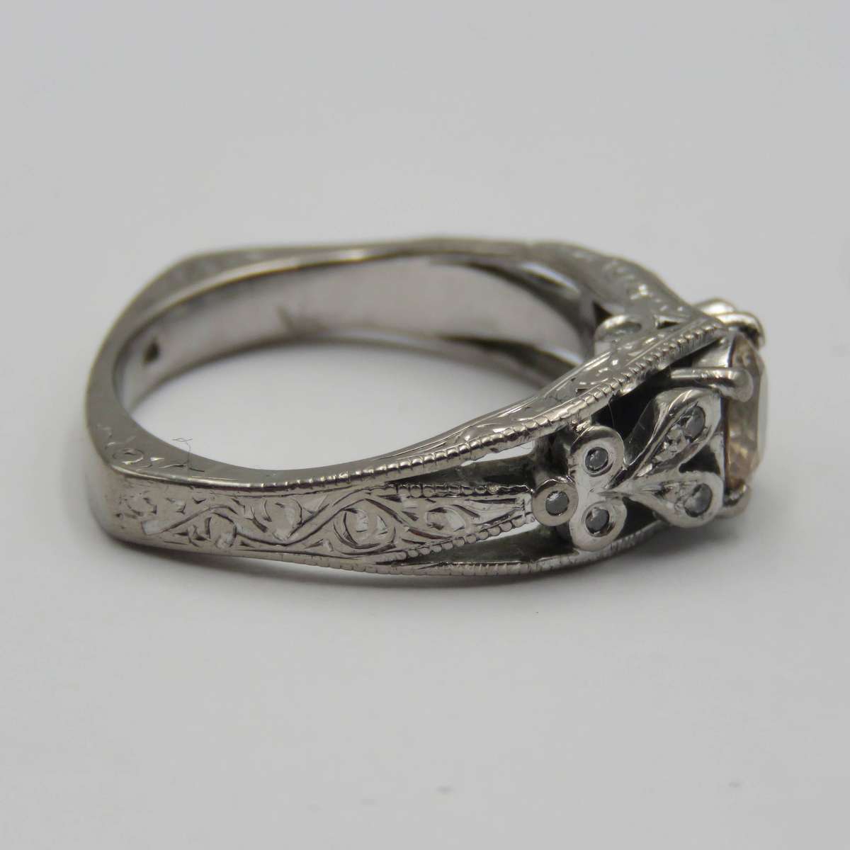 Bespoke 9kt White gold ring with Champagne citrine with 12 small diamonds in design - weighs 5,4g