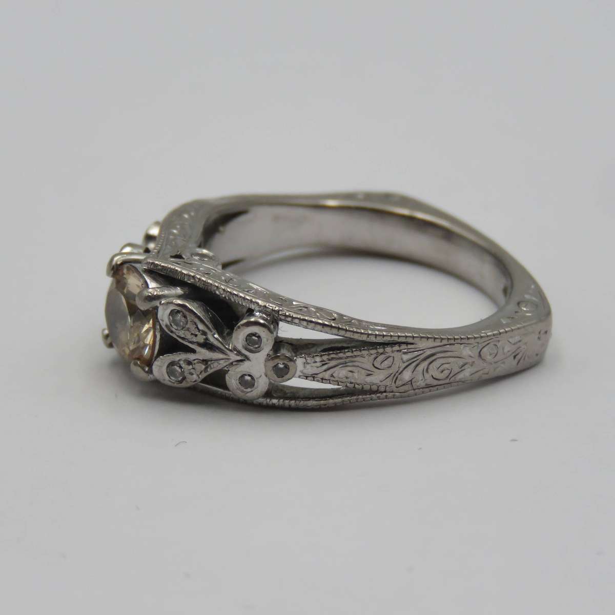 Bespoke 9kt White gold ring with Champagne citrine with 12 small diamonds in design - weighs 5,4g