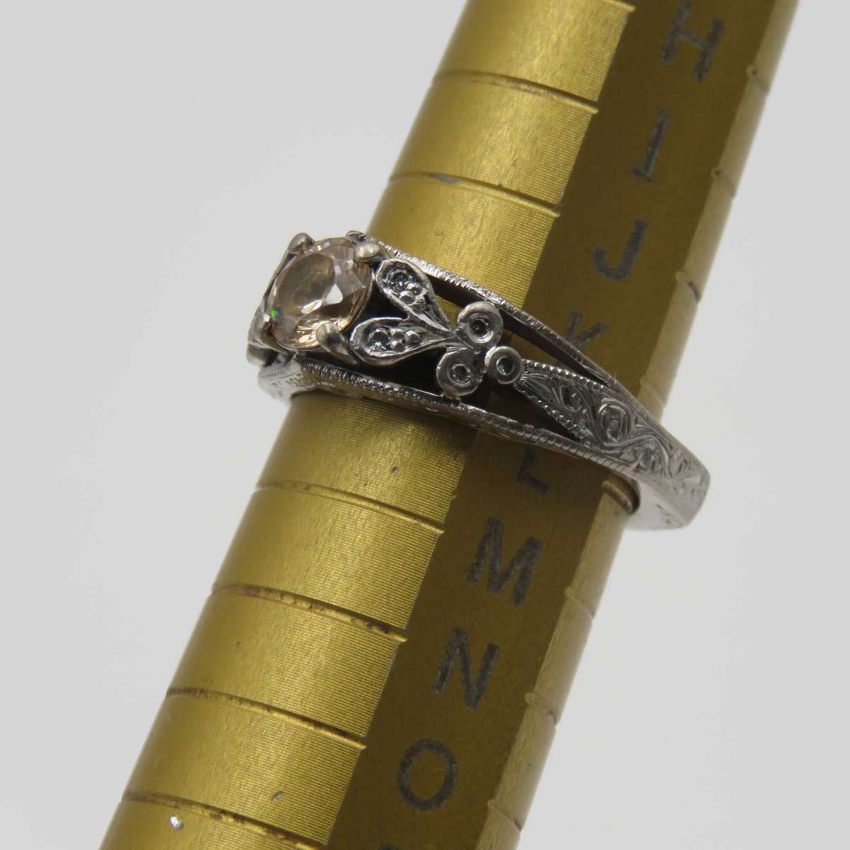Bespoke 9kt White gold ring with Champagne citrine with 12 small diamonds in design - weighs 5,4g