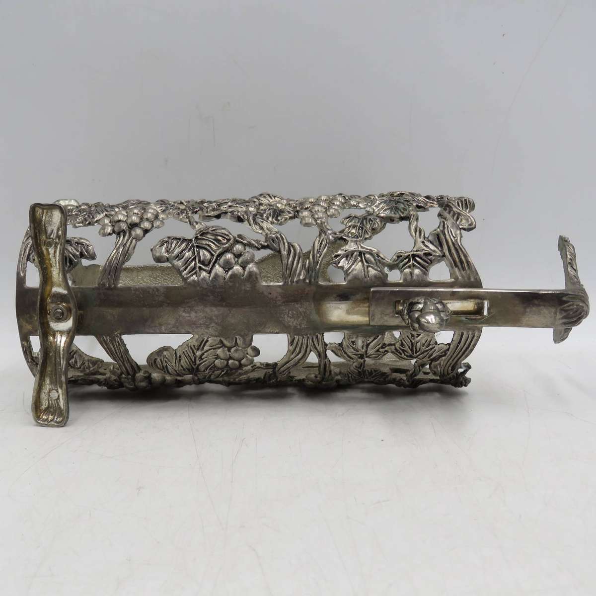 Vintage silverplated vintner motif wine bottle stand