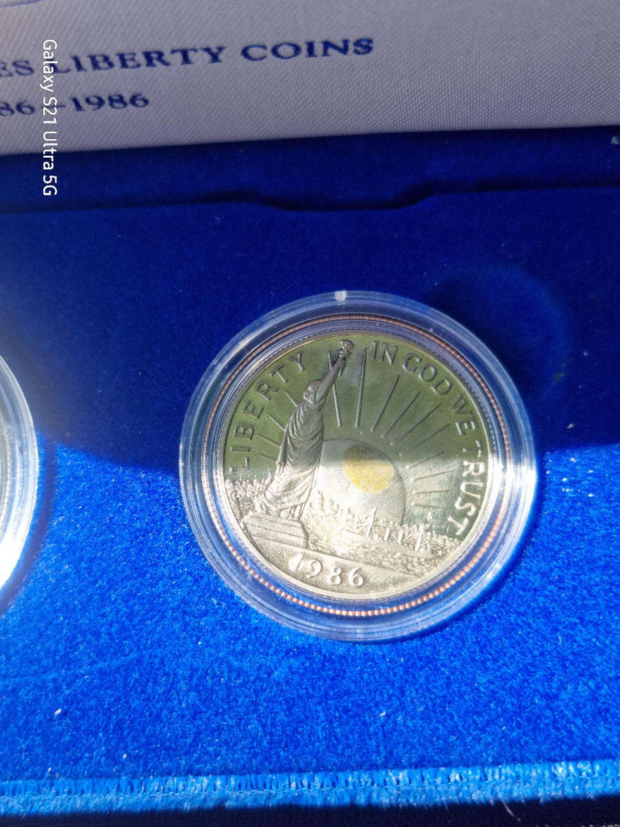 Statue of Liberty Silver Dollor & Clad Hald Coins