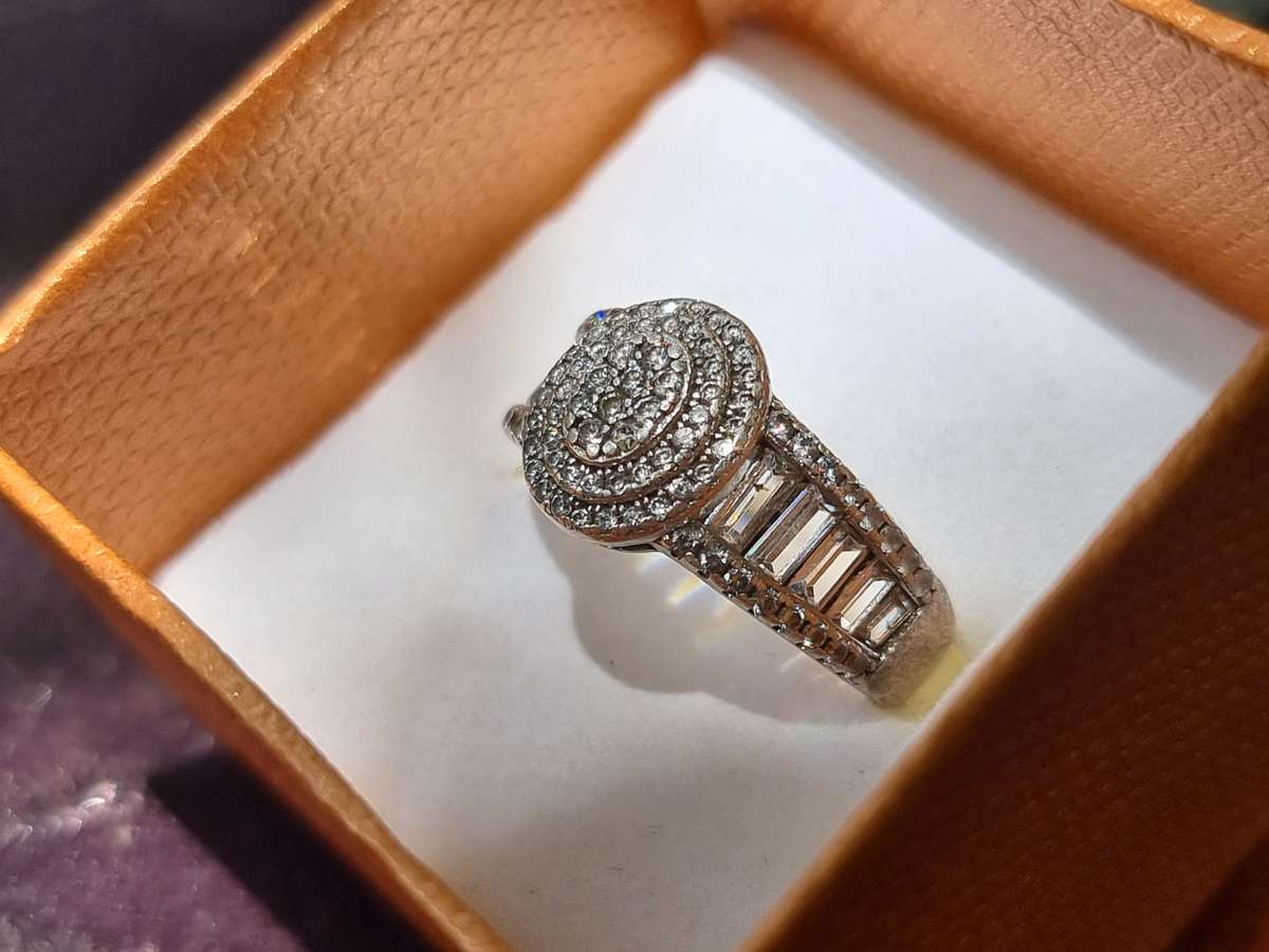 "ROUND CUT" CZ and Baguettes 925 Silver Dress Ring. ( Genuine Silver.)