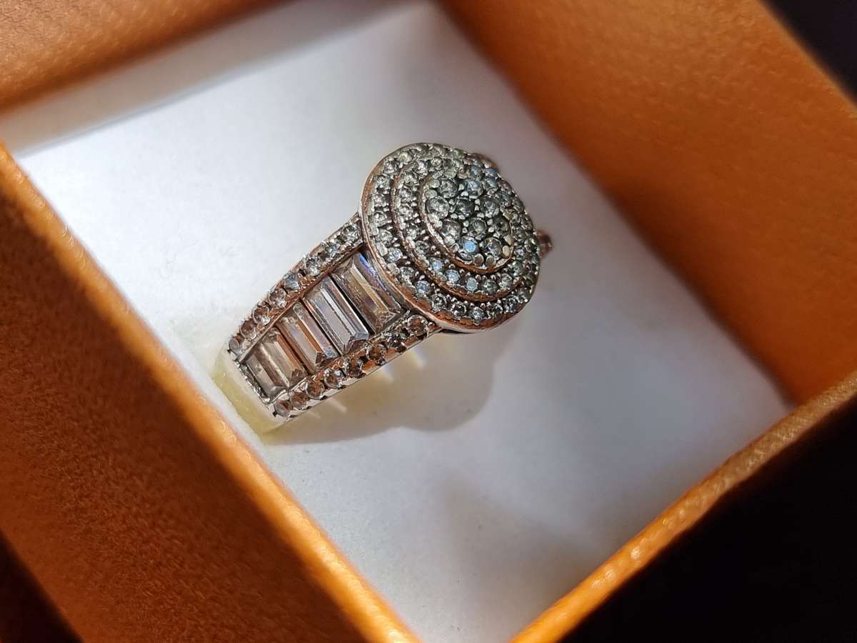"ROUND CUT" CZ and Baguettes 925 Silver Dress Ring. ( Genuine Silver.)