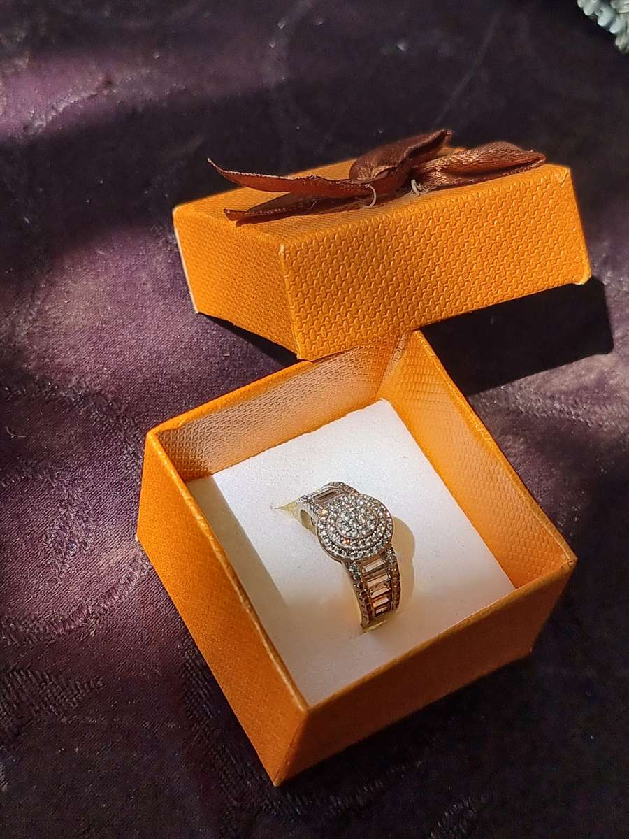 "ROUND CUT" CZ and Baguettes 925 Silver Dress Ring. ( Genuine Silver.)