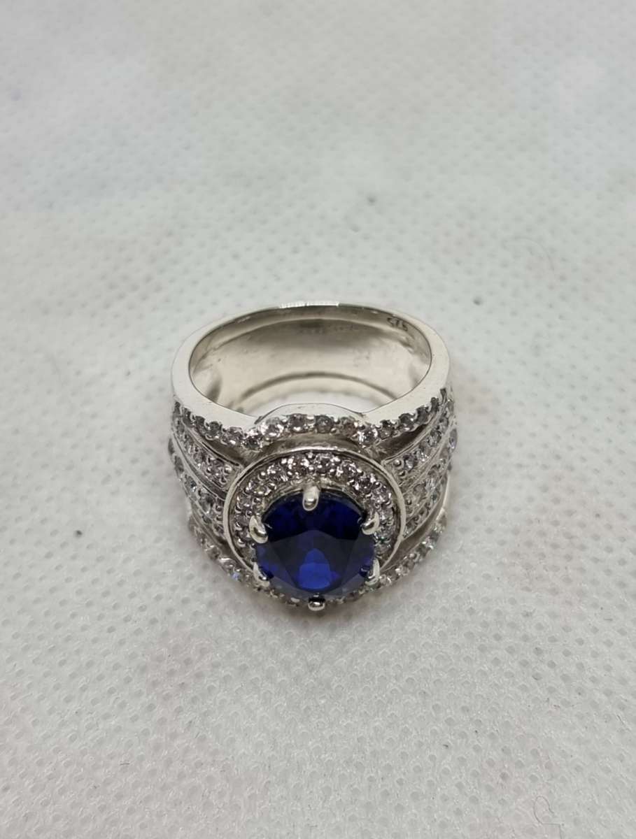 "Blue Sapphire CZ Oval Cut" 925 Sterling Silver Dress Ring. ( Genuine Silver. )