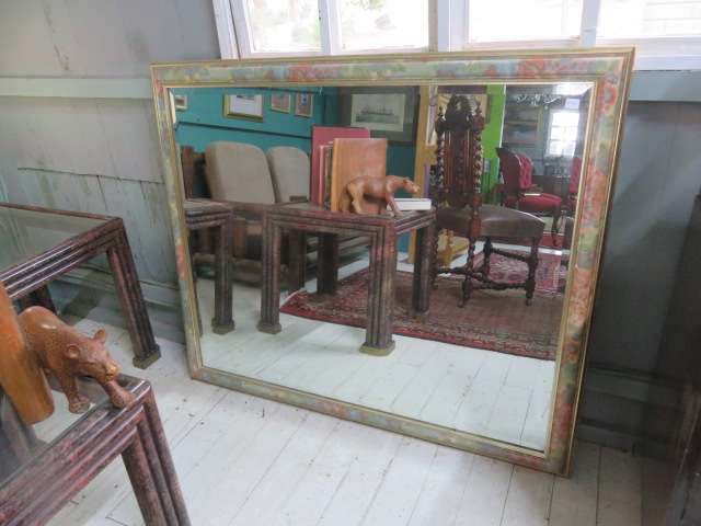 Large floral framed bevelled mirror