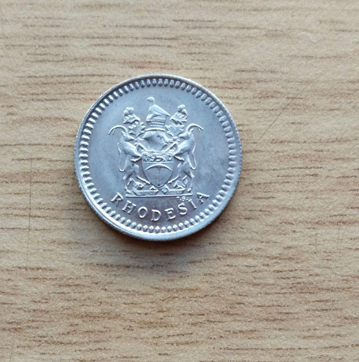 Rhodesia collection of 23 old coins. Some Good. (5 cents seems to be struck off centre)