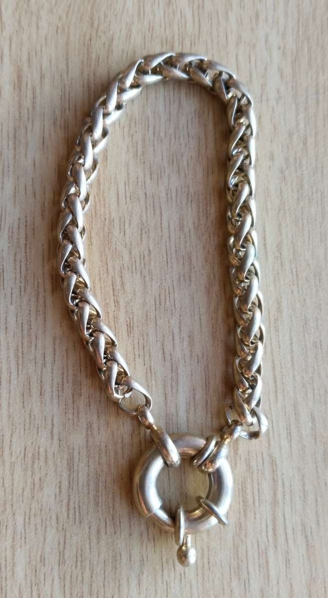 Collection of charm bracelets, necklace and watch.