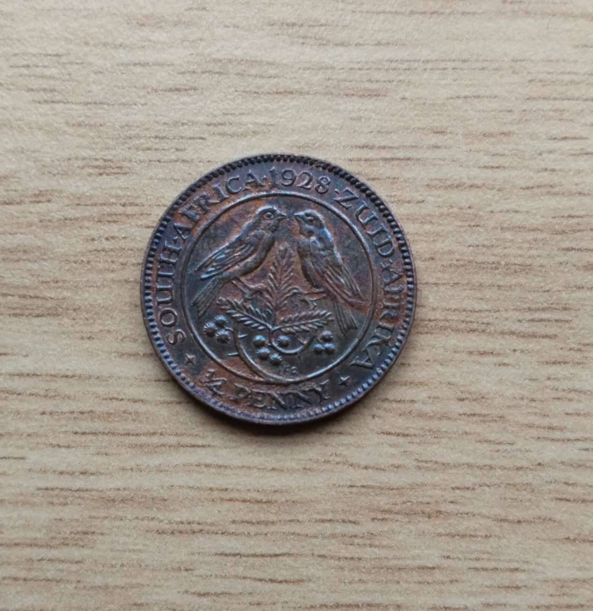 South Africa 1928 Quarter Penny Farthing in good condition.