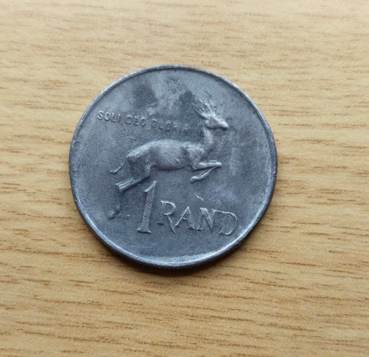 Error 1978 South Africa one rand. Looks like lead.