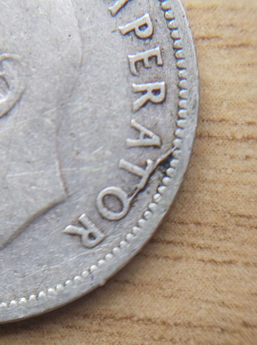 Error 1942 Silver South Africa Shilling.