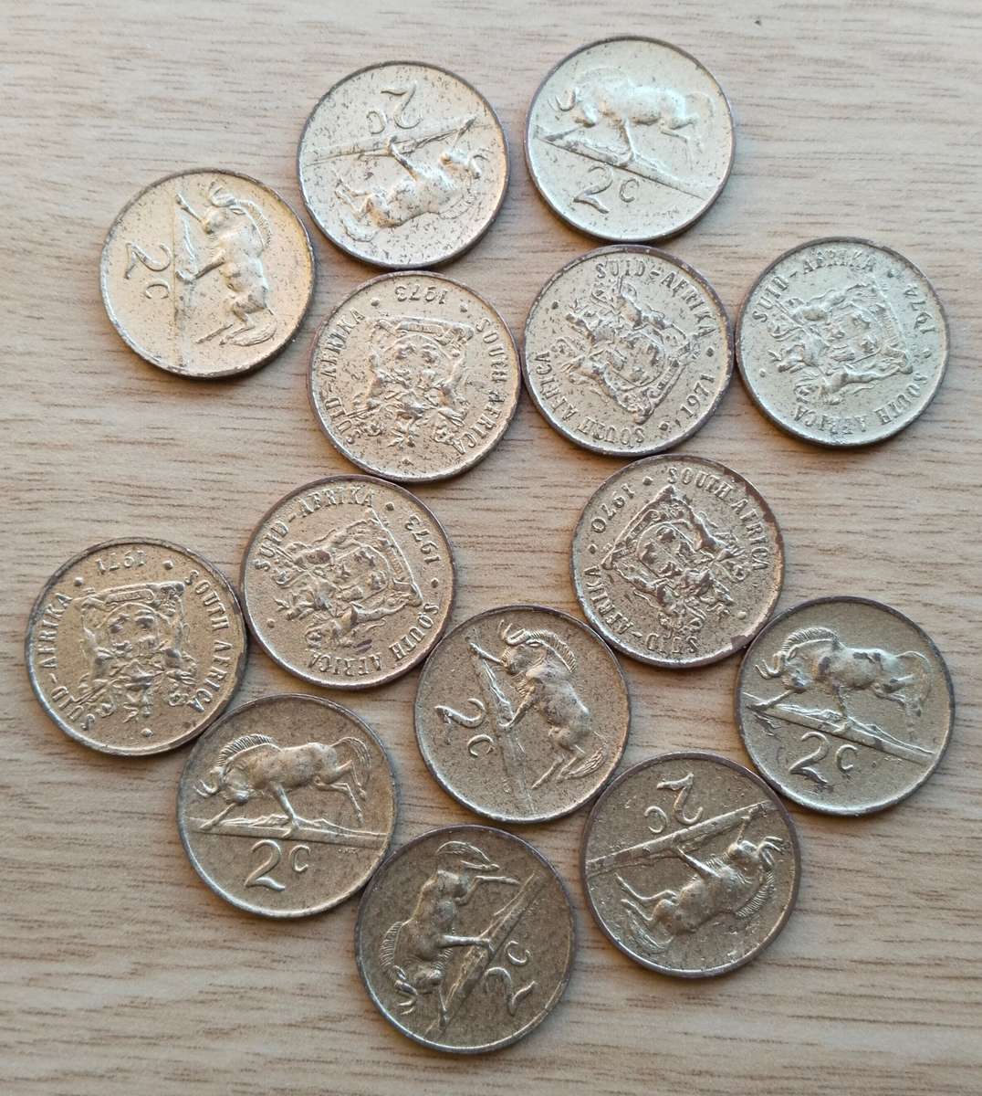 South Africa collection of 14 Gold coloured like 2 cents. One bid takes all.