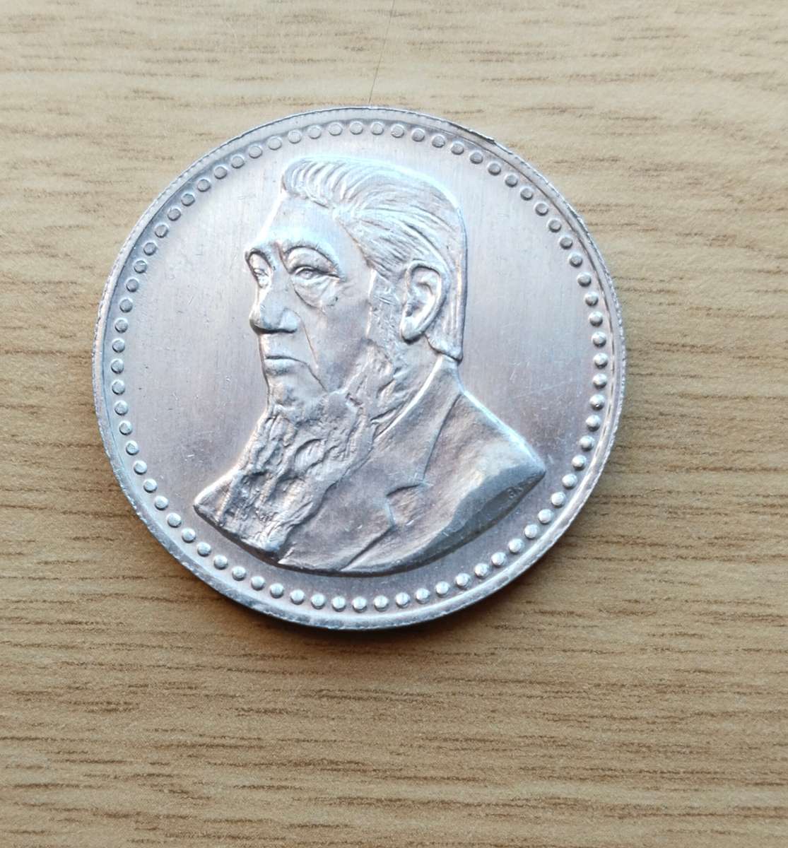 ZAR Paul Kruger Gold Reef City 5 Shillings token. Good condition.