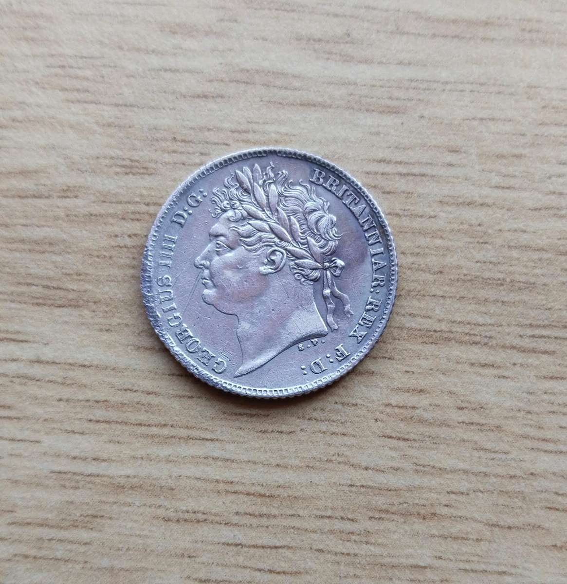 Great Britain 1825 King George 1111 Silver Sixpence. Good condition.