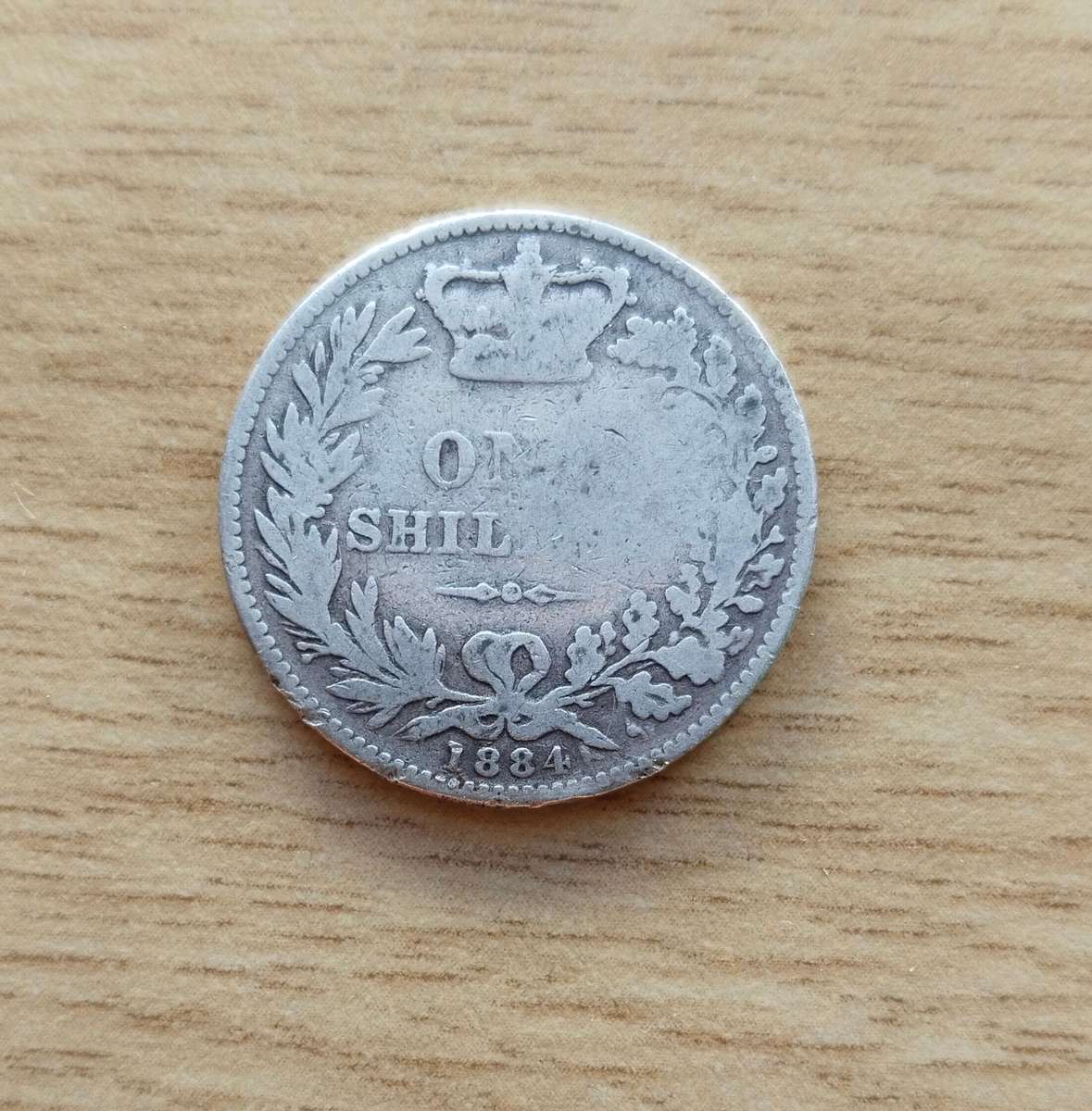 Great Britain 1884 Queen Victoria silver Shilling.