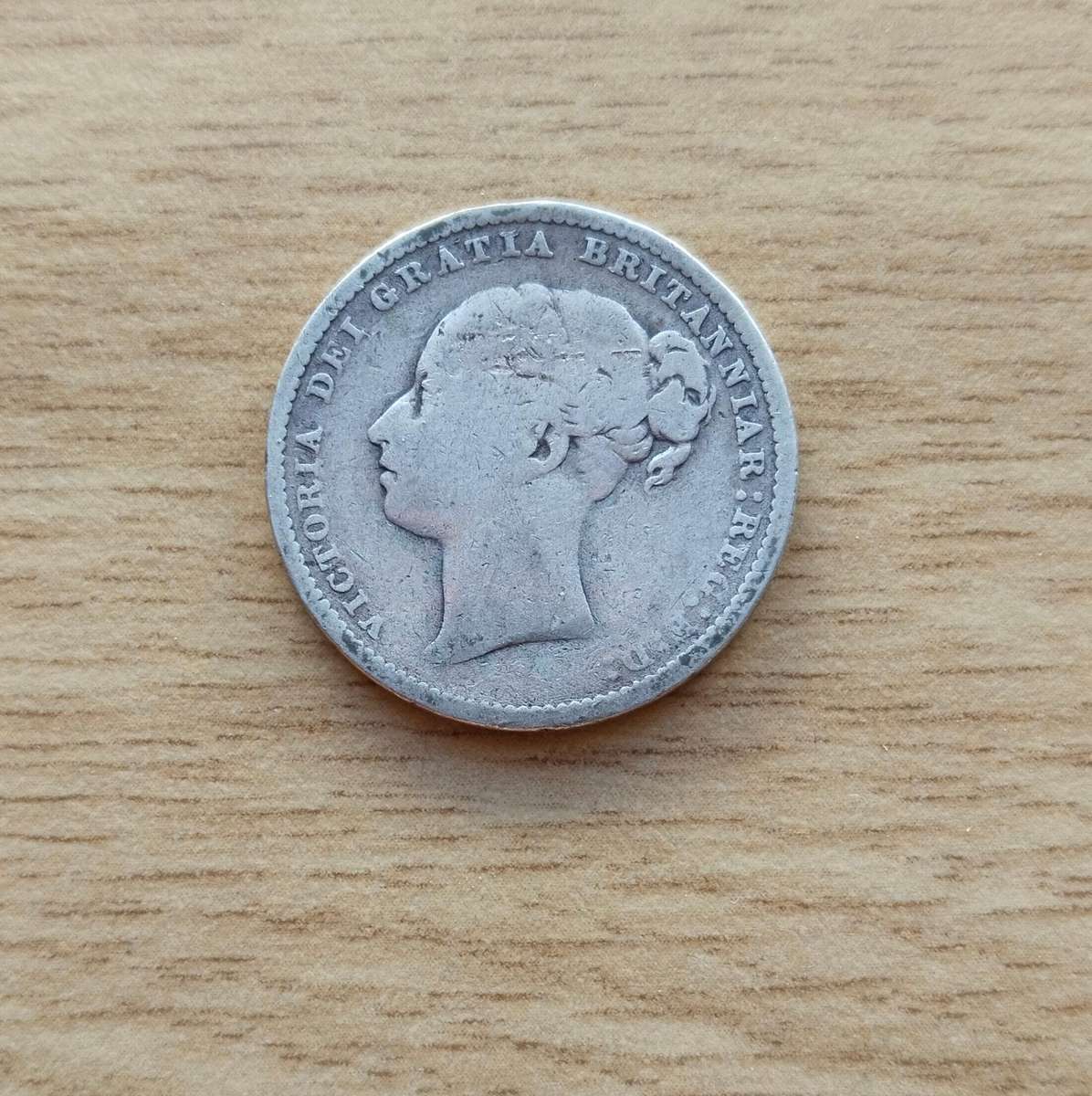 Great Britain 1884 Queen Victoria silver Shilling.