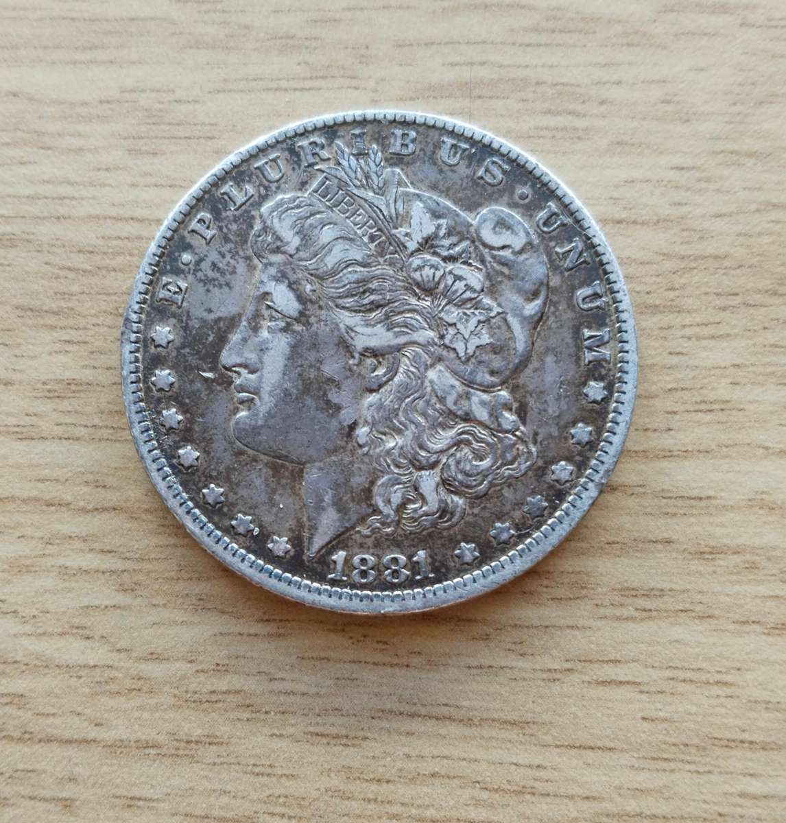 America 1881 O Silver Morgan Dollar.