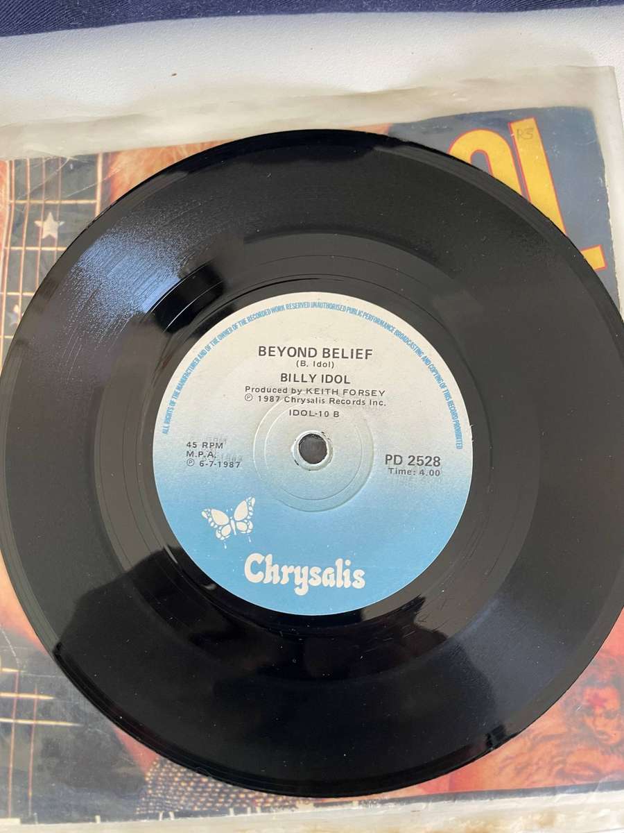 Billy Idol 7 inch single-Sweet Sixteen/Beyond belief