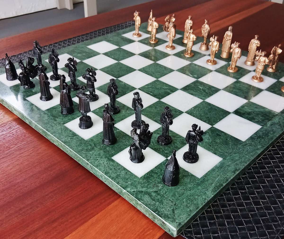 Italian marble chess board with metal medieval pieces. Beautiful.