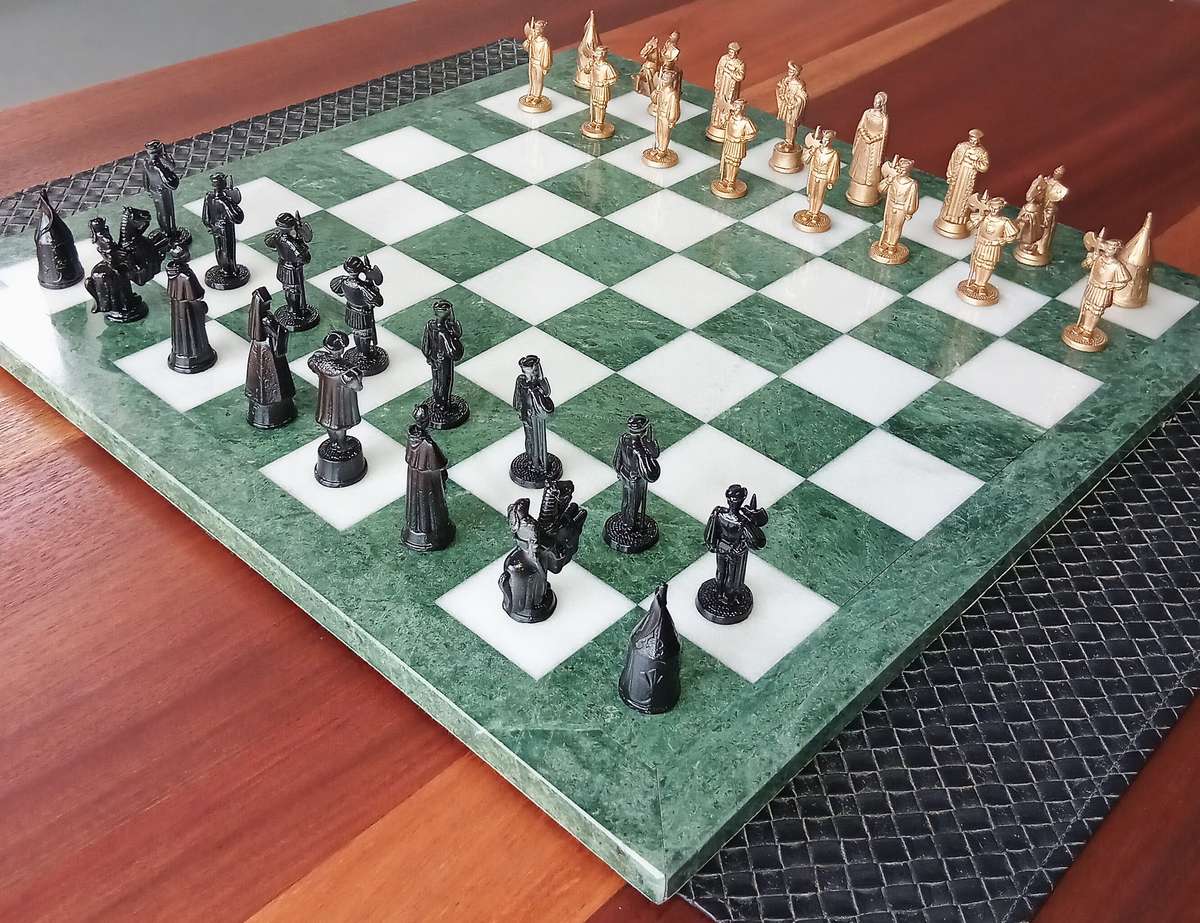 Italian marble chess board with metal medieval pieces. Beautiful.