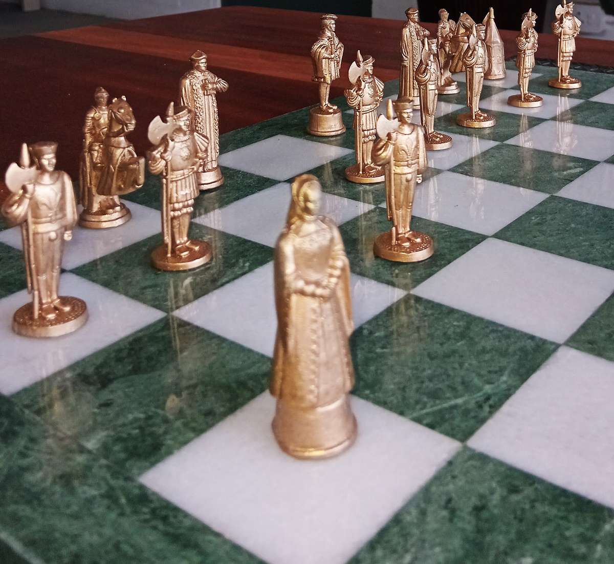 Italian marble chess board with metal medieval pieces. Beautiful.