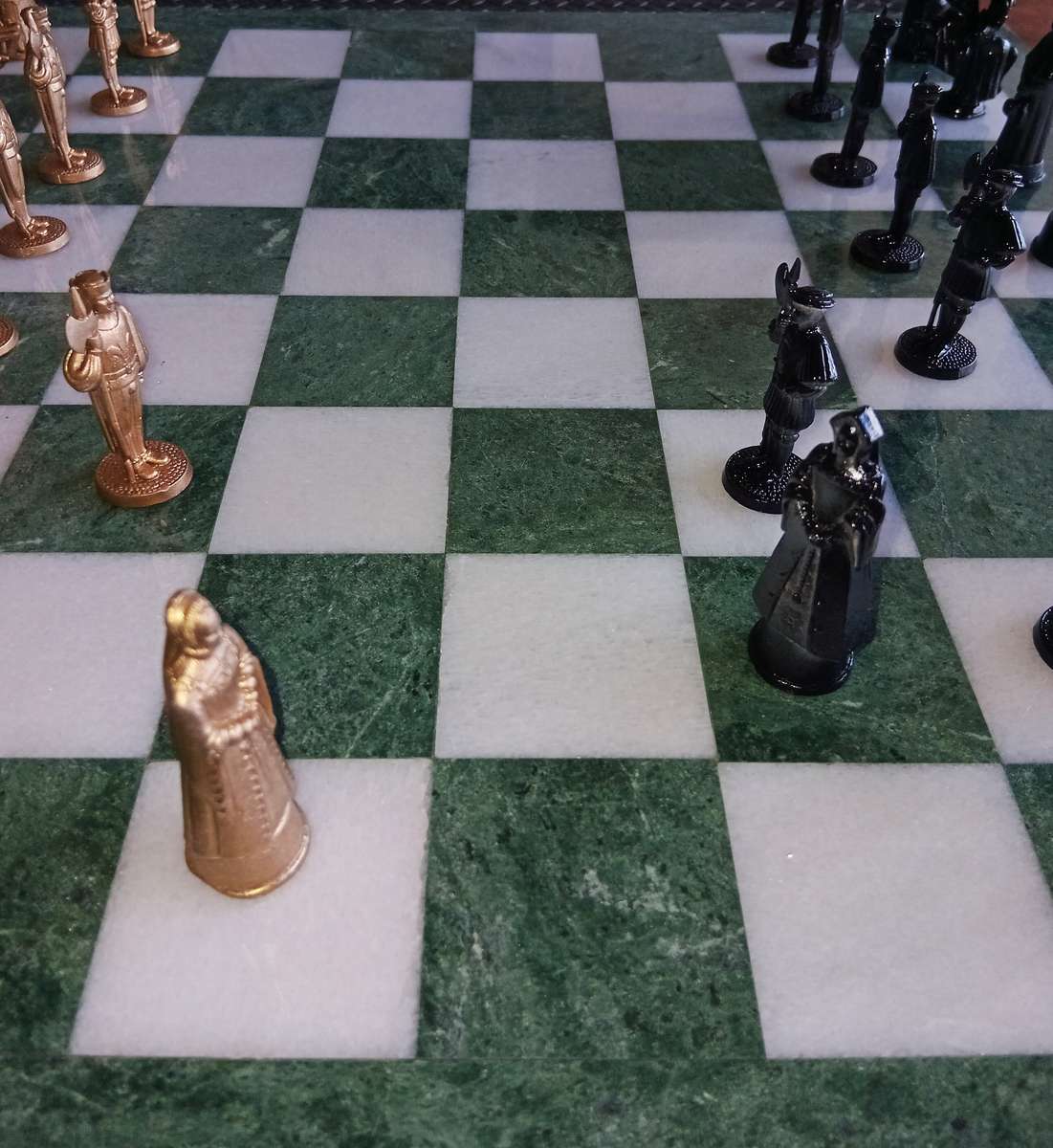 Italian marble chess board with metal medieval pieces. Beautiful.