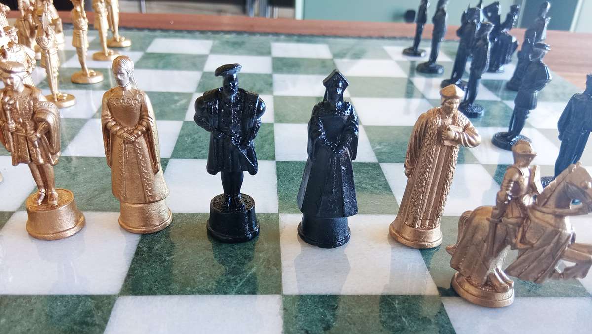 Italian marble chess board with metal medieval pieces. Beautiful.