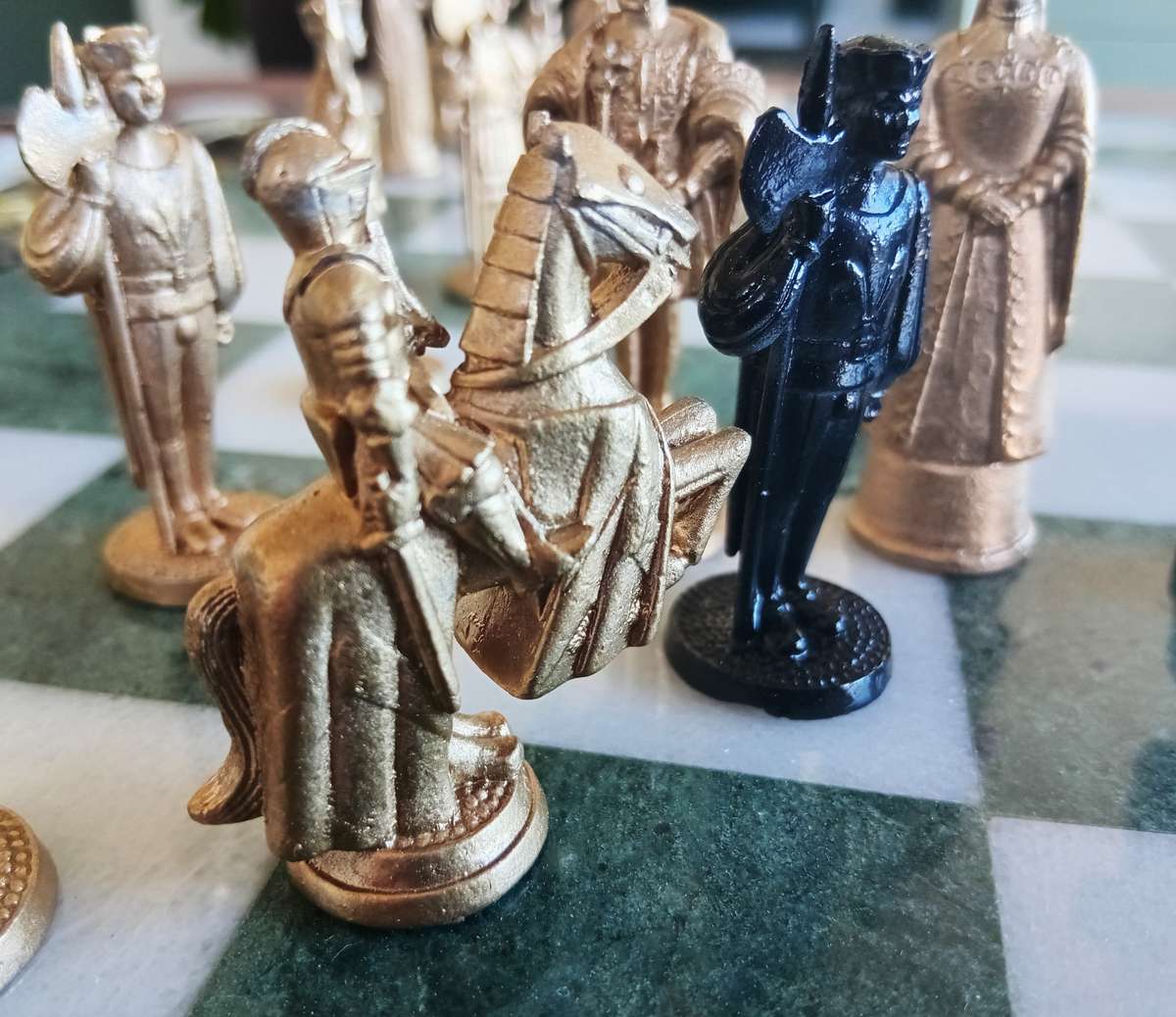 Italian marble chess board with metal medieval pieces. Beautiful.