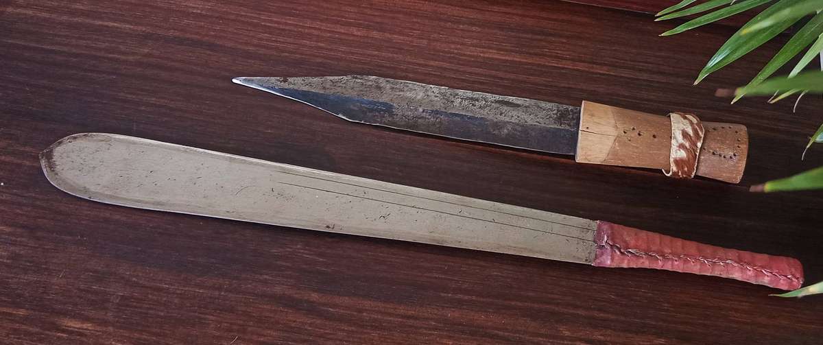 2 x cased African daggers