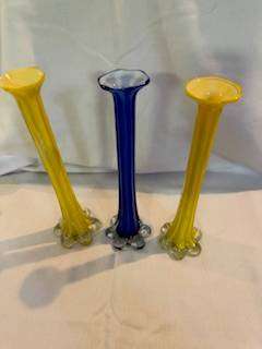 Three tall thin vases
