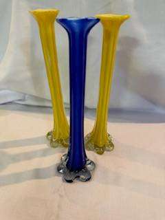 Three tall thin vases