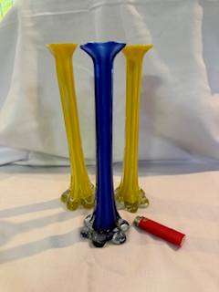 Three tall thin vases