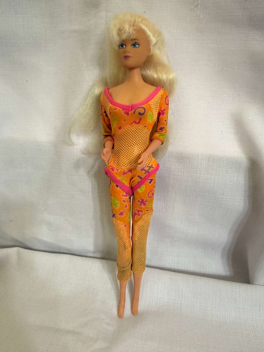 One Barbie and two Ken's