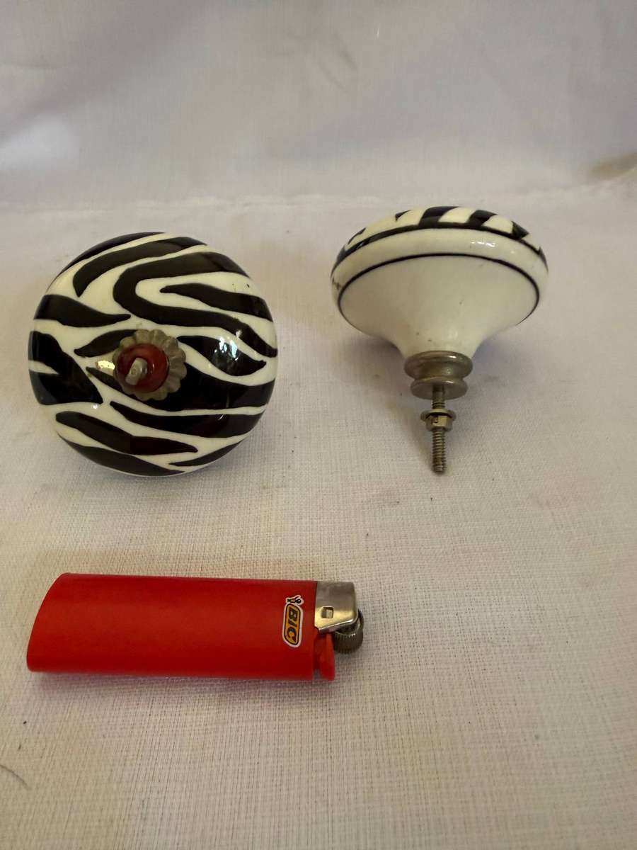 TWO LARGE DOOR KNOBS
