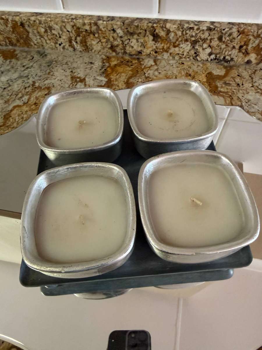 FOUR CANDLE POTS ON METAL STAND