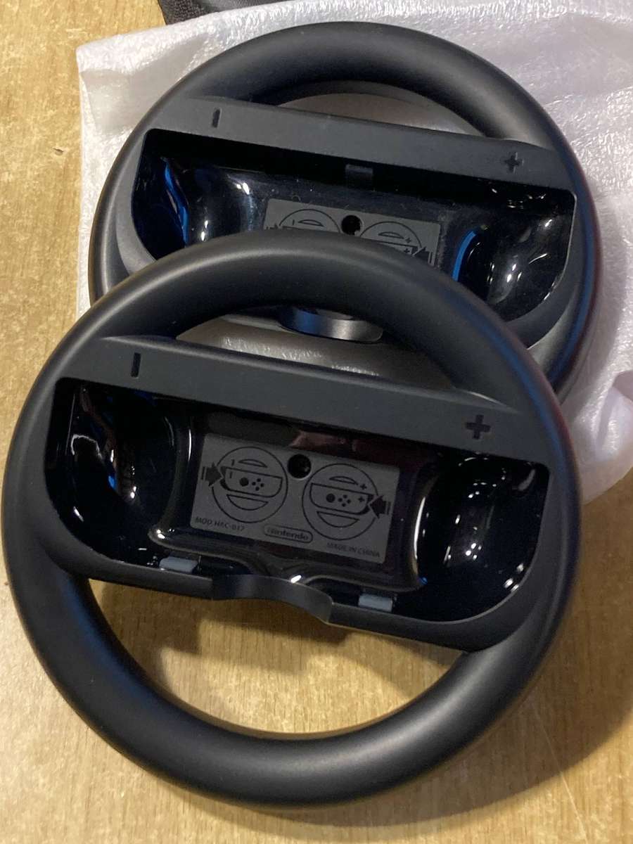 Nintendo Switch accessories -  Carrying Case and Joy-Con Wheel Pair