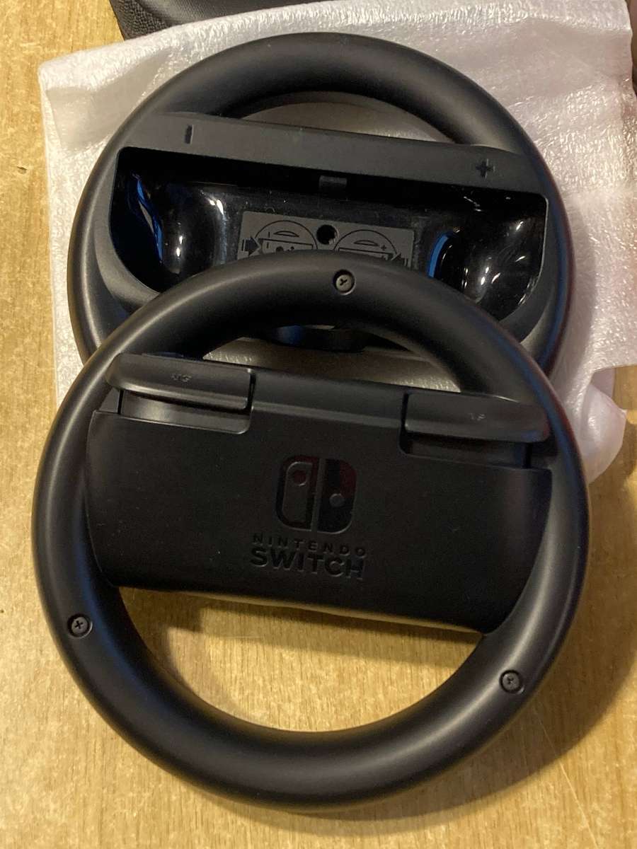 Nintendo Switch accessories -  Carrying Case and Joy-Con Wheel Pair
