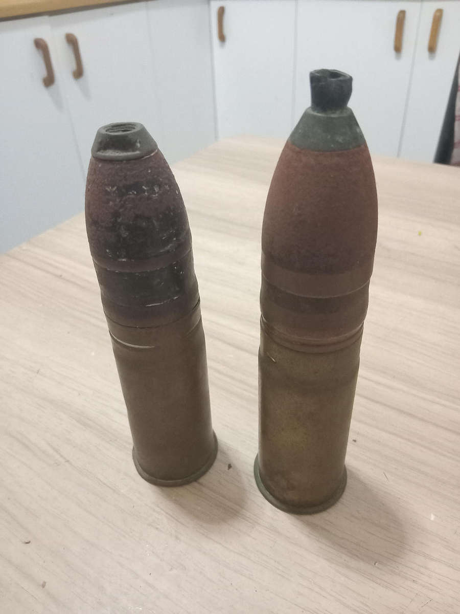 Two used German brass souvenir war bullets with projectile heads