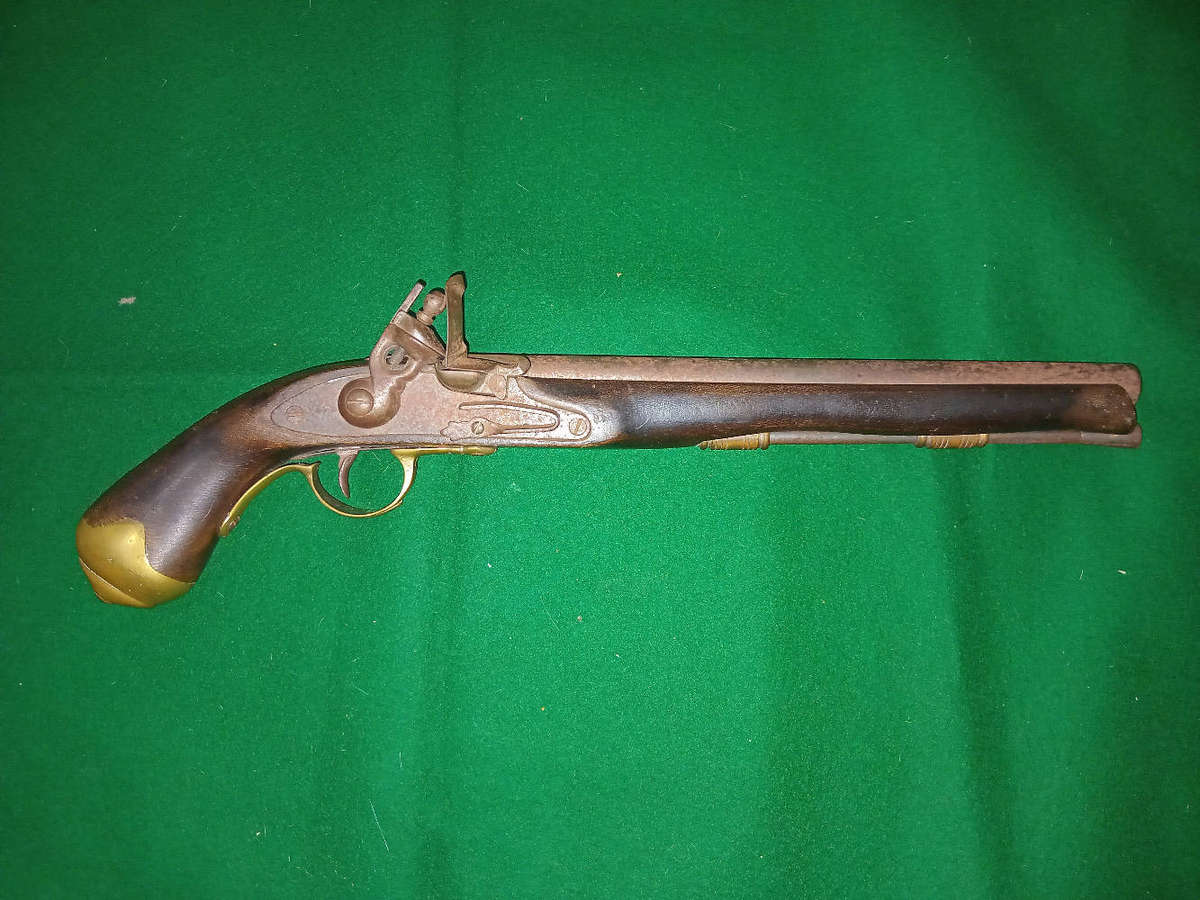 Antique flint lock pistol, original, made from solid heavy wood