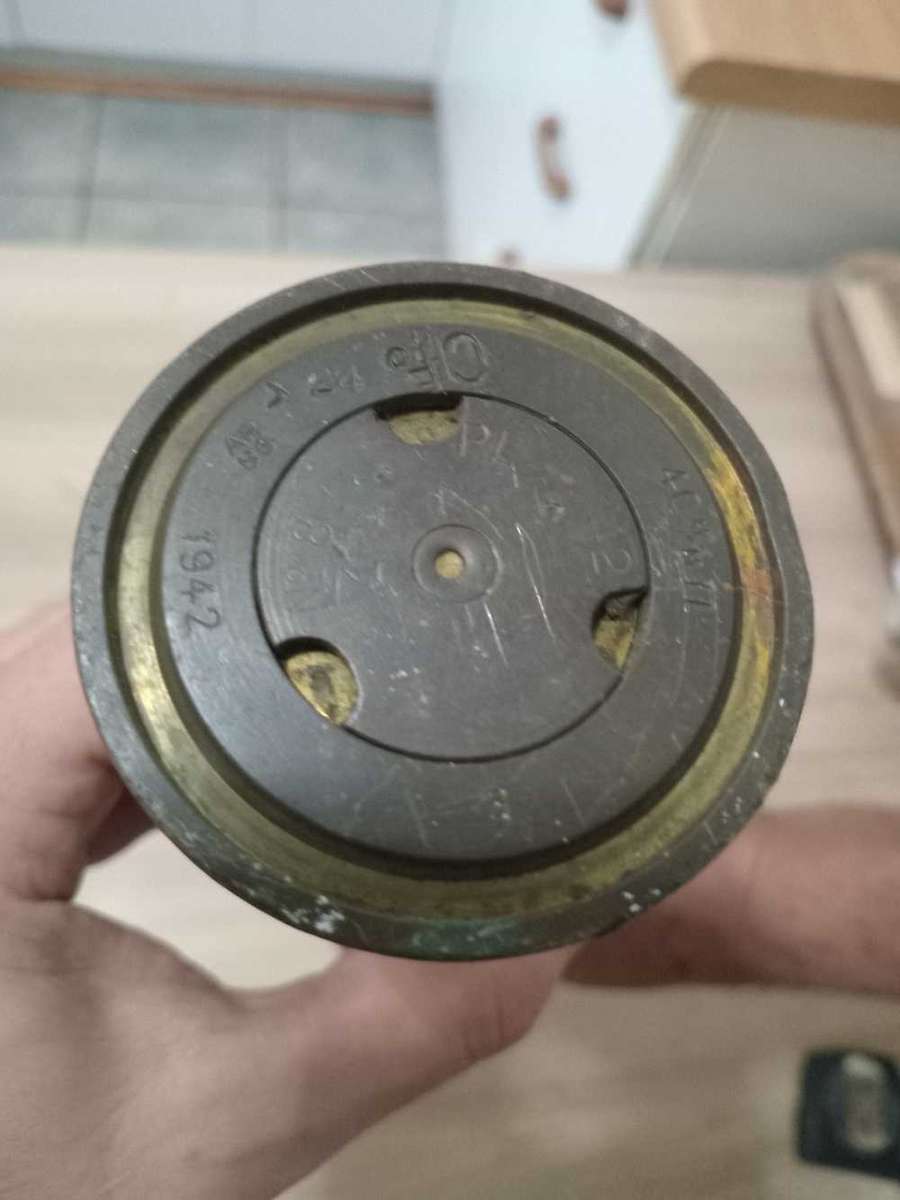 Artillery shell casing with head projectile (empty, used)