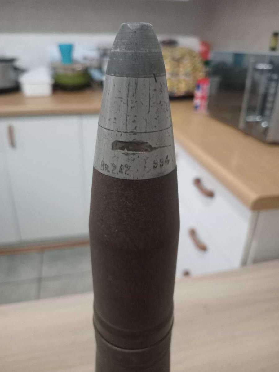 Artillery shell casing with head projectile (empty, used)