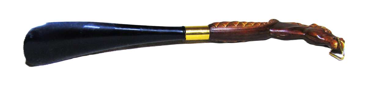 Vintage early plastic horse head shoe horn